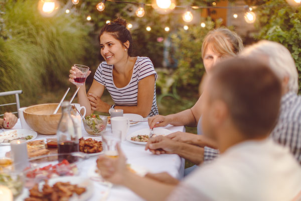 Backyard Holiday Dinner Parties are Making a Comeback and Here's Why